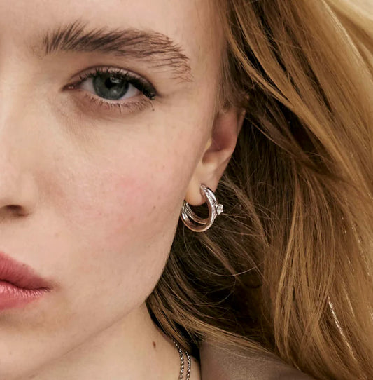 أقراط نومينيشن فضة بتصميم أبدي مرصع زركونيا