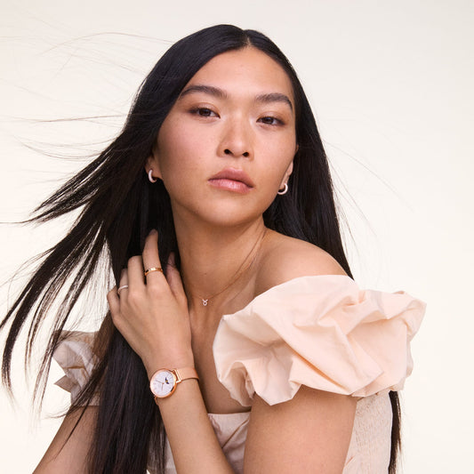 ساعة دانيال ولينغتون 32 ستانلس ستيل روز جولد