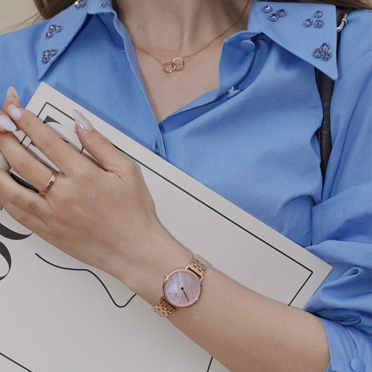 ساعة دانيال ولينغتون نسائي 28 بتصميم أنيق ولون روز جولد